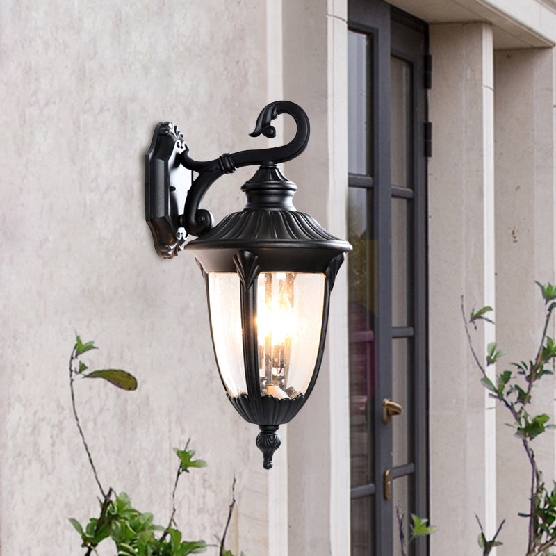 Rustic Outdoor Wall Lamp: Clear Bubble Glass Black Sconce Urn with Curling Arm [1-Head Fixture]