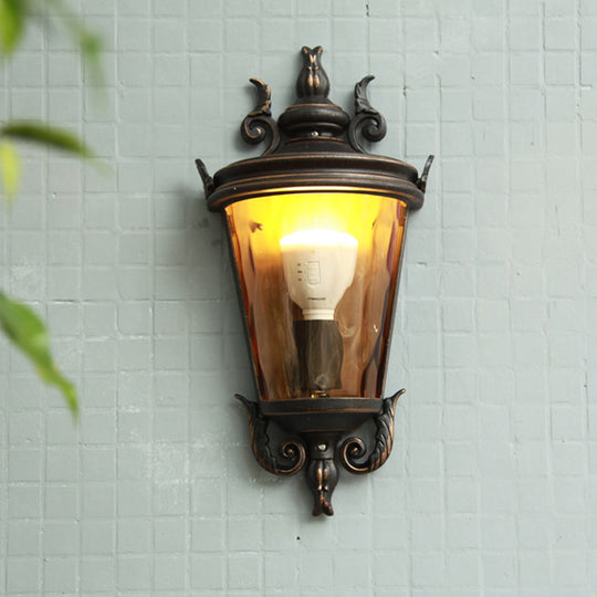 Amber Glass Country Lantern Sconce in Brown and Black: 1-Light Wall Lighting