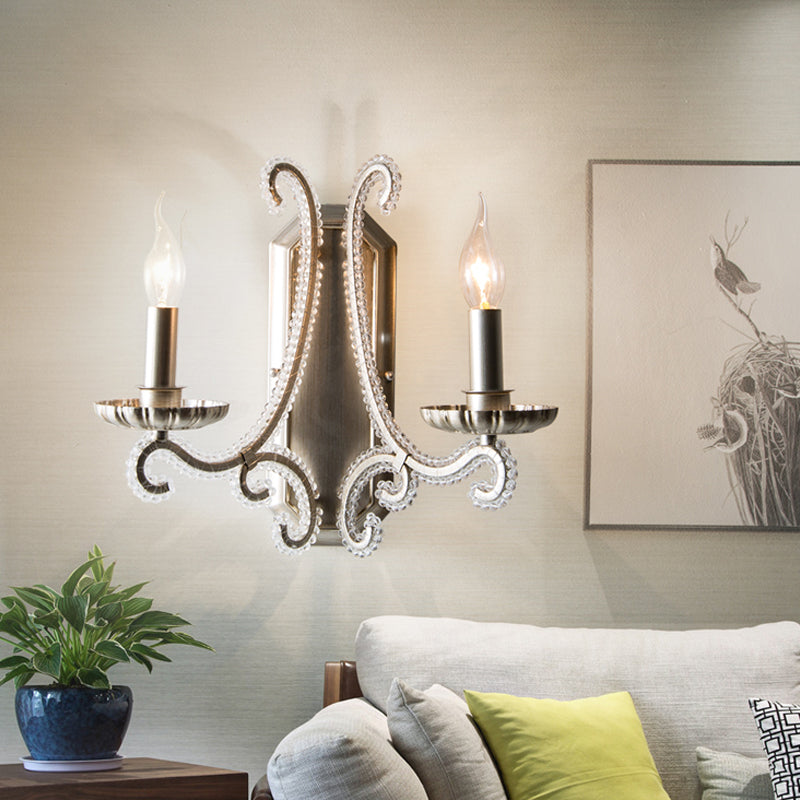 Traditional Crystal Strand Wall Mounted Bedroom Light with Silver Candelabra Design