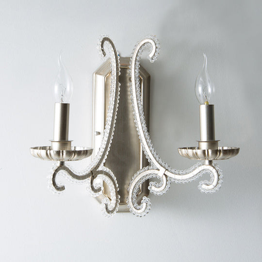 Traditional Crystal Strand Wall Mounted Bedroom Light with Silver Candelabra Design