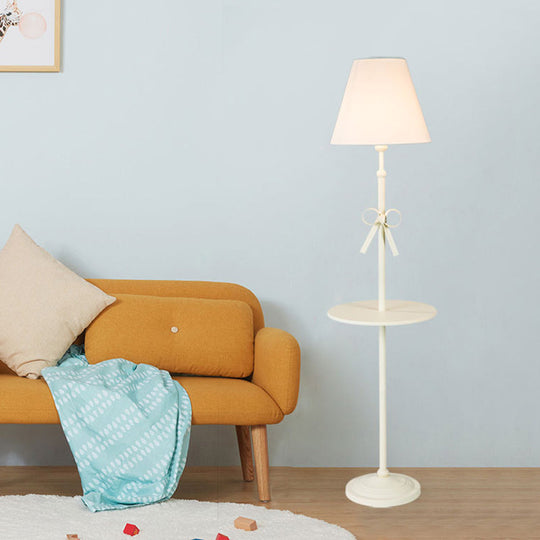 Fabric Conic Floor Standing Lamp for Kids - Single Beige/Pink Lighting with Table and Bow-Knot