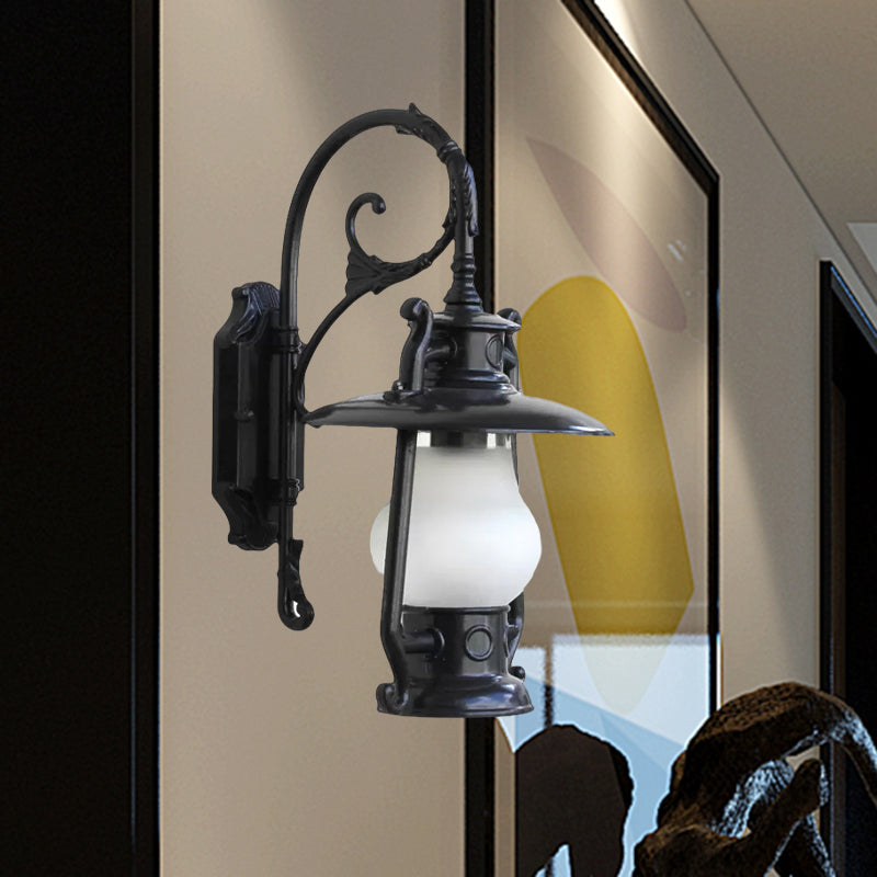 Frosted Glass Coastal Wall Mounted Lantern: Single Bulb Outdoor Sconce Light in Black/Aged Brass