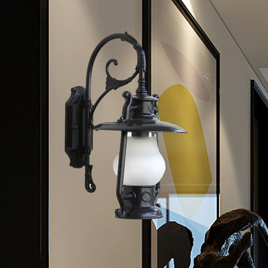 Frosted Glass Coastal Wall Mounted Lantern: Single Bulb Outdoor Sconce Light in Black/Aged Brass